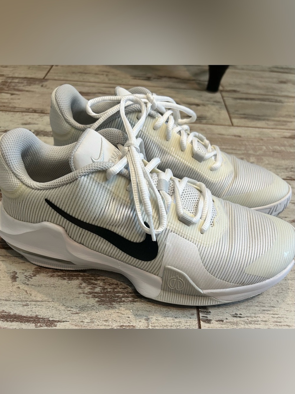 Men’s size 9.5 Nike White Sneakers with Black Swoosh